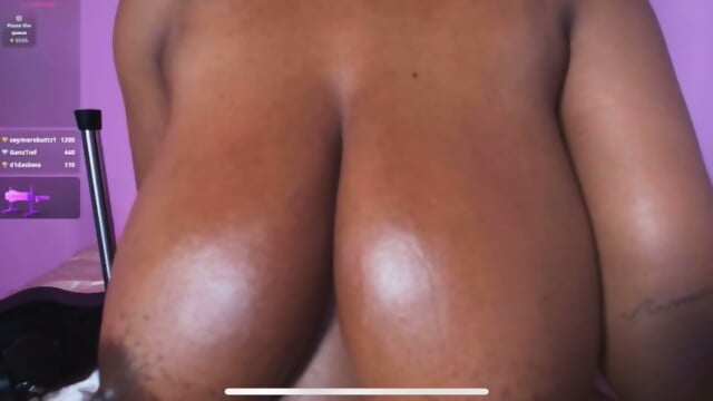Oily Ebony Breasts